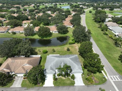 WELCOME TO YOUR MAINTENANCE FREE HOME! This quaint  charming on Falcon Watch Golf Club in Florida - for sale on GolfHomes.com, golf home, golf lot