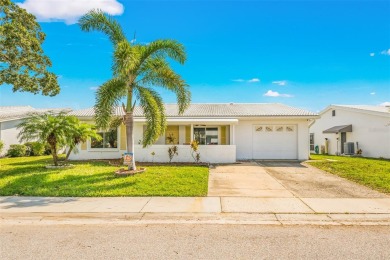 PRICE TO SELL!  This Lovely and Well Maintained Home in Popular on Mainlands Golf Club in Florida - for sale on GolfHomes.com, golf home, golf lot