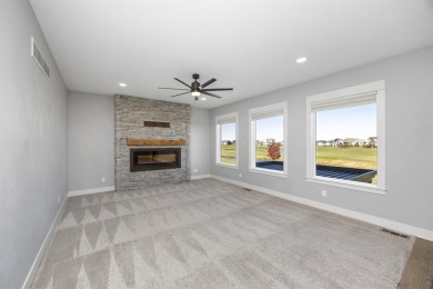 Move in ready on beautiful Otter Creek golf course. With over 3 on Otter Creek Golf Course in Iowa - for sale on GolfHomes.com, golf home, golf lot