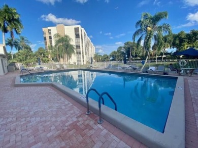 BEAUTIFUL CORNER UNIT WITH EAST EXPOSURE, LAKE, GOLF COURSE, AND on The Country Club At Boca Raton in Florida - for sale on GolfHomes.com, golf home, golf lot