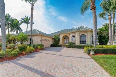 As soon as you walk through your double glass doors, you will be on Santa Lucia River Club in Florida - for sale on GolfHomes.com, golf home, golf lot