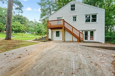 It's hard to miss this fully renovated, 4 side brick beauty on Alfred Tup Holmes Golf Course in Georgia - for sale on GolfHomes.com, golf home, golf lot