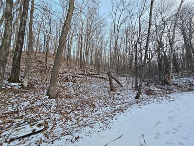 Escape to your own private retreat on this rolling, wooded 0 on Hardwoods Golf Club At Mille Lacs in Minnesota - for sale on GolfHomes.com, golf home, golf lot