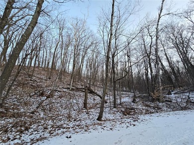 Escape to your own private retreat on this rolling, wooded 0 on Hardwoods Golf Club At Mille Lacs in Minnesota - for sale on GolfHomes.com, golf home, golf lot
