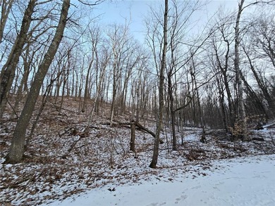 Escape to your own private retreat on this rolling, wooded 0 on Hardwoods Golf Club At Mille Lacs in Minnesota - for sale on GolfHomes.com, golf home, golf lot