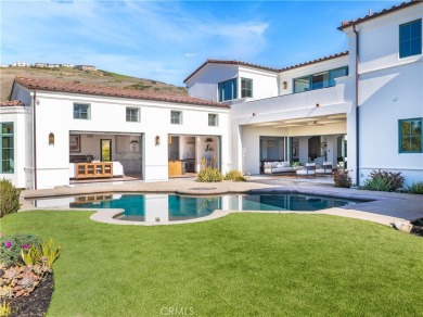 Built in 2019, this Spanish-style residence in The Estates at on Trump National Golf Course in California - for sale on GolfHomes.com, golf home, golf lot