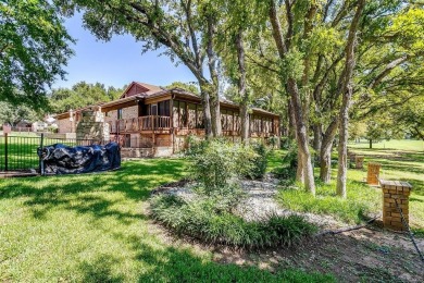 Pecan Plantation custom home on 7th hole golf course. Beautiful on Pecan Plantation Country Club in Texas - for sale on GolfHomes.com, golf home, golf lot