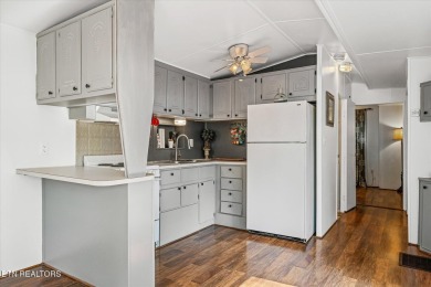 This spacious Park Model in Holiday Out had been completely on Lake Tansi Village Country Club in Tennessee - for sale on GolfHomes.com, golf home, golf lot