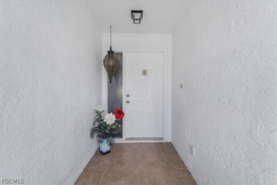 Step into the inviting warmth of this charming 2-bedroom plus on  in Florida - for sale on GolfHomes.com, golf home, golf lot
