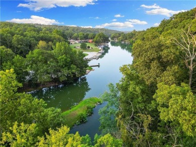 245 feet of Lake Windsor shoreline, 1.91 acres, & only minutes on Bella Vista Country Club - Berksdale in Arkansas - for sale on GolfHomes.com, golf home, golf lot