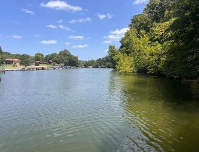 245 feet of Lake Windsor shoreline, 1.91 acres, & only minutes on Bella Vista Country Club - Berksdale in Arkansas - for sale on GolfHomes.com, golf home, golf lot