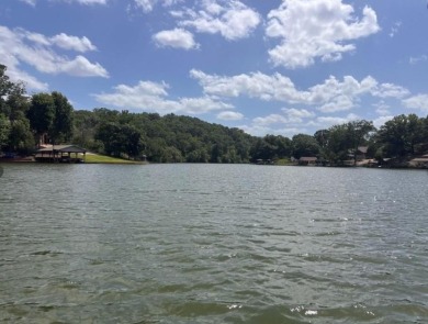 245 feet of Lake Windsor shoreline, 1.91 acres, & only minutes on Bella Vista Country Club - Berksdale in Arkansas - for sale on GolfHomes.com, golf home, golf lot