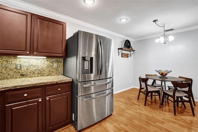 SHOWINGS BEGIN AT OPEN HOUSE ON SATURDAY, MARCH 14 FROM 12-3 PM! on Pine Island Ridge Country Club in Florida - for sale on GolfHomes.com, golf home, golf lot