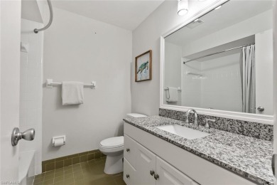 This charming 2 bedroom, 2 bath waterfront residence offers on The Glades Golf and Country Club in Florida - for sale on GolfHomes.com, golf home, golf lot