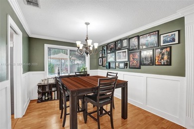 SHOWINGS BEGIN AT OPEN HOUSE ON SATURDAY, MARCH 14 FROM 12-3 PM! on Pine Island Ridge Country Club in Florida - for sale on GolfHomes.com, golf home, golf lot