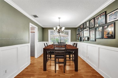 SHOWINGS BEGIN AT OPEN HOUSE ON SATURDAY, MARCH 14 FROM 12-3 PM! on Pine Island Ridge Country Club in Florida - for sale on GolfHomes.com, golf home, golf lot