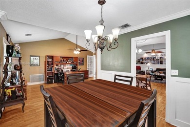 SHOWINGS BEGIN AT OPEN HOUSE ON SATURDAY, MARCH 14 FROM 12-3 PM! on Pine Island Ridge Country Club in Florida - for sale on GolfHomes.com, golf home, golf lot