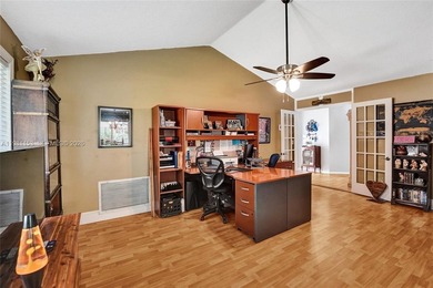 SHOWINGS BEGIN AT OPEN HOUSE ON SATURDAY, MARCH 14 FROM 12-3 PM! on Pine Island Ridge Country Club in Florida - for sale on GolfHomes.com, golf home, golf lot