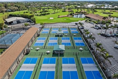 This charming 2 bedroom, 2 bath waterfront residence offers on The Glades Golf and Country Club in Florida - for sale on GolfHomes.com, golf home, golf lot