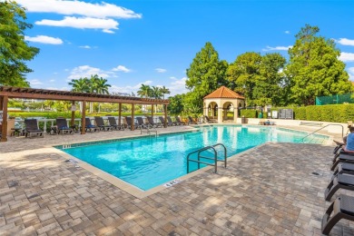 Maintenance free living in Feathersound awaits in the desirable on Feather Sound Country Club in Florida - for sale on GolfHomes.com, golf home, golf lot