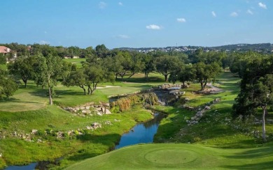 Updated home on a quiet street in the guard-gated Hills of on The Hills of Lakeway Golf Course in Texas - for sale on GolfHomes.com, golf home, golf lot