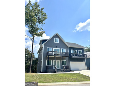 Welcome to this large new modern home in the Innsbruck Golf on Innsbruck Resort and Golf Club in Georgia - for sale on GolfHomes.com, golf home, golf lot