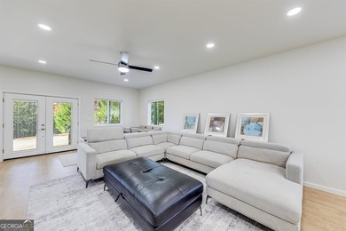 Welcome to this large new modern home in the Innsbruck Golf on Innsbruck Resort and Golf Club in Georgia - for sale on GolfHomes.com, golf home, golf lot