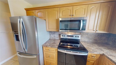 Spacious luxury condo on the north side of Sunrise Lakes Blvd on Sunrise Lakes Phase III in Florida - for sale on GolfHomes.com, golf home, golf lot