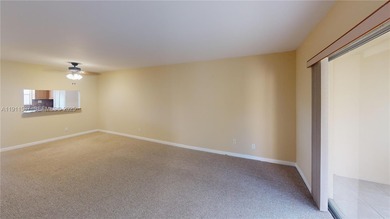 Spacious luxury condo on the north side of Sunrise Lakes Blvd on Sunrise Lakes Phase III in Florida - for sale on GolfHomes.com, golf home, golf lot