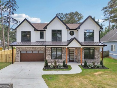 Experience modern luxury in this newly built custom farmhouse on East Lake Golf Club in Georgia - for sale on GolfHomes.com, golf home, golf lot