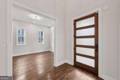 Experience modern luxury in this newly built custom farmhouse on East Lake Golf Club in Georgia - for sale on GolfHomes.com, golf home, golf lot