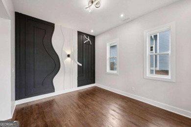 Experience modern luxury in this newly built custom farmhouse on East Lake Golf Club in Georgia - for sale on GolfHomes.com, golf home, golf lot
