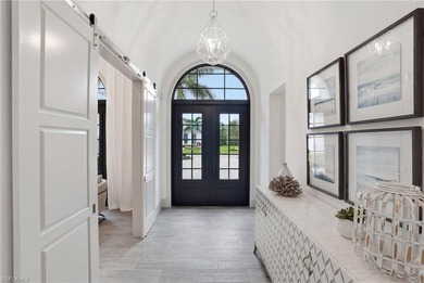 Stunning luxury coastal living in the highly sought-after Marsh on The Golf Club At Fiddlers Creek in Florida - for sale on GolfHomes.com, golf home, golf lot