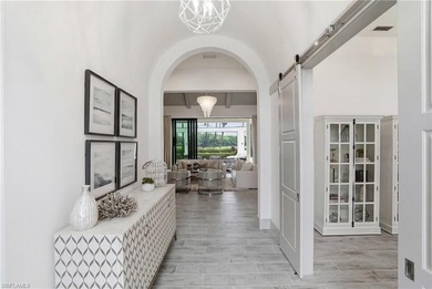 Stunning luxury coastal living in the highly sought-after Marsh on The Golf Club At Fiddlers Creek in Florida - for sale on GolfHomes.com, golf home, golf lot