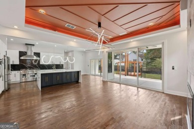 Experience modern luxury in this newly built custom farmhouse on East Lake Golf Club in Georgia - for sale on GolfHomes.com, golf home, golf lot