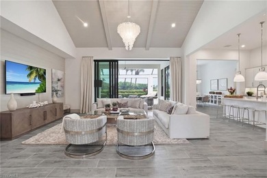 Stunning luxury coastal living in the highly sought-after Marsh on The Golf Club At Fiddlers Creek in Florida - for sale on GolfHomes.com, golf home, golf lot