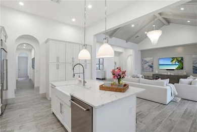 Stunning luxury coastal living in the highly sought-after Marsh on The Golf Club At Fiddlers Creek in Florida - for sale on GolfHomes.com, golf home, golf lot