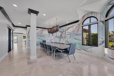 A luxurious coastal retreat at the water's edge on Longboat Key on Links on Longboat Golf Club in Florida - for sale on GolfHomes.com, golf home, golf lot