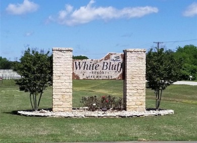 NICE LEVEL LOT WITH FEW TREES TO BUILD YOUR BEAUTIFUL LAKE HOME on White Bluff Resort - Old Course in Texas - for sale on GolfHomes.com, golf home, golf lot