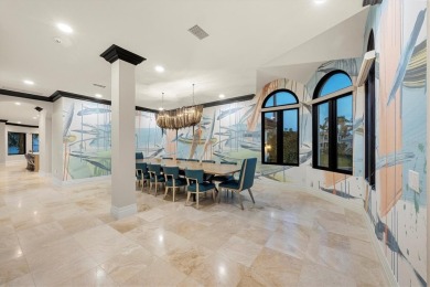 A luxurious coastal retreat at the water's edge on Longboat Key on Links on Longboat Golf Club in Florida - for sale on GolfHomes.com, golf home, golf lot