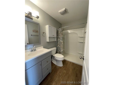 Welcome to your perfect Lake of the Ozarks getaway! This on Sycamore Creek Golf Club in Missouri - for sale on GolfHomes.com, golf home, golf lot