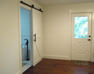 Elegance meets country charm in this completely remodeled home on Holly Lake Ranch Golf Club in Texas - for sale on GolfHomes.com, golf home, golf lot
