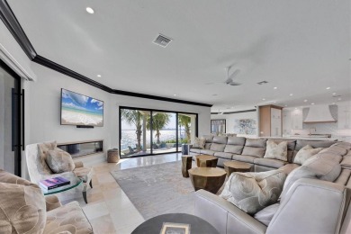 A luxurious coastal retreat at the water's edge on Longboat Key on Links on Longboat Golf Club in Florida - for sale on GolfHomes.com, golf home, golf lot
