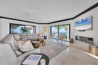 A luxurious coastal retreat at the water's edge on Longboat Key on Links on Longboat Golf Club in Florida - for sale on GolfHomes.com, golf home, golf lot