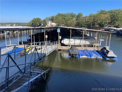 Welcome to your perfect Lake of the Ozarks getaway! This on Sycamore Creek Golf Club in Missouri - for sale on GolfHomes.com, golf home, golf lot