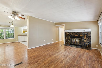 *PRICE REDUCED* This well-maintained home, with a fenced-in on Oyster Bay Golf Links in North Carolina - for sale on GolfHomes.com, golf home, golf lot