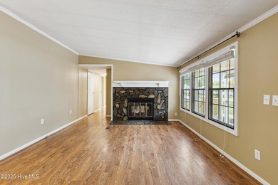 *PRICE REDUCED* This well-maintained home, with a fenced-in on Oyster Bay Golf Links in North Carolina - for sale on GolfHomes.com, golf home, golf lot