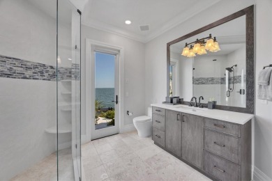A luxurious coastal retreat at the water's edge on Longboat Key on Links on Longboat Golf Club in Florida - for sale on GolfHomes.com, golf home, golf lot