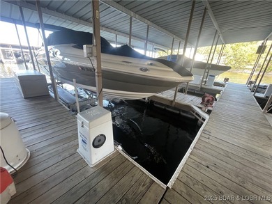 Welcome to your perfect Lake of the Ozarks getaway! This on Sycamore Creek Golf Club in Missouri - for sale on GolfHomes.com, golf home, golf lot