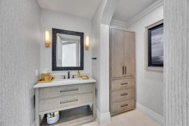 A luxurious coastal retreat at the water's edge on Longboat Key on Links on Longboat Golf Club in Florida - for sale on GolfHomes.com, golf home, golf lot